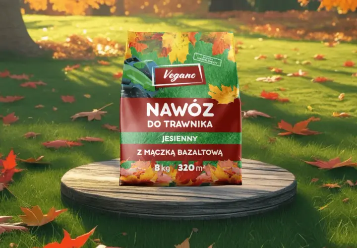 Jesienny nawóz do trawnika Vegano z mączką bazaltową, który zawiera superfosfat, na tle jesiennego ogrodu.